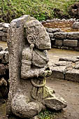 Candi Cetho - Sculptures of the eighth terrace holding his hands in a ritual gesture. 